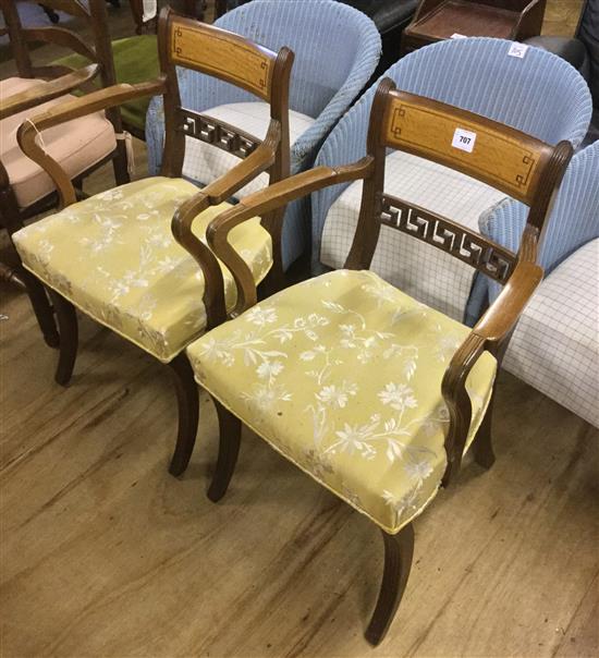 Two inlaid chairs in the Oriental taste covered in yellow silk
